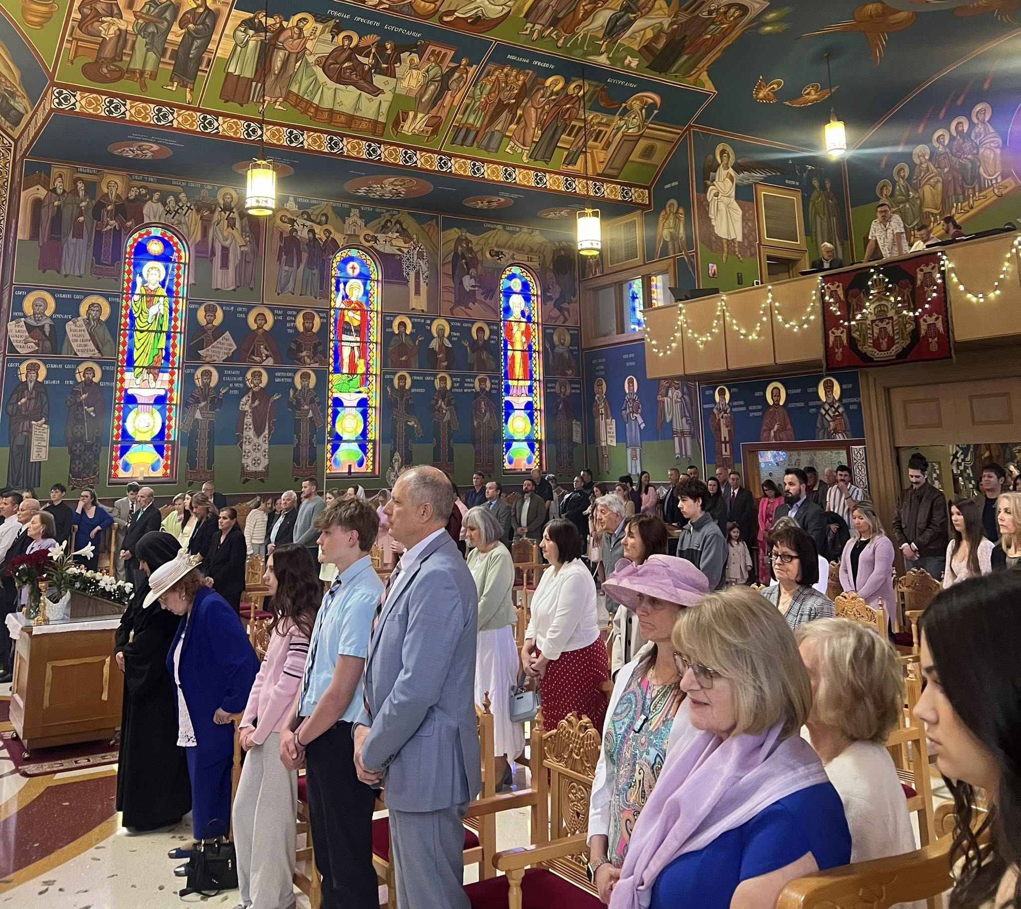 The faithful standing in prayer during the Paschal Liturgy at St. Sava Cathedral